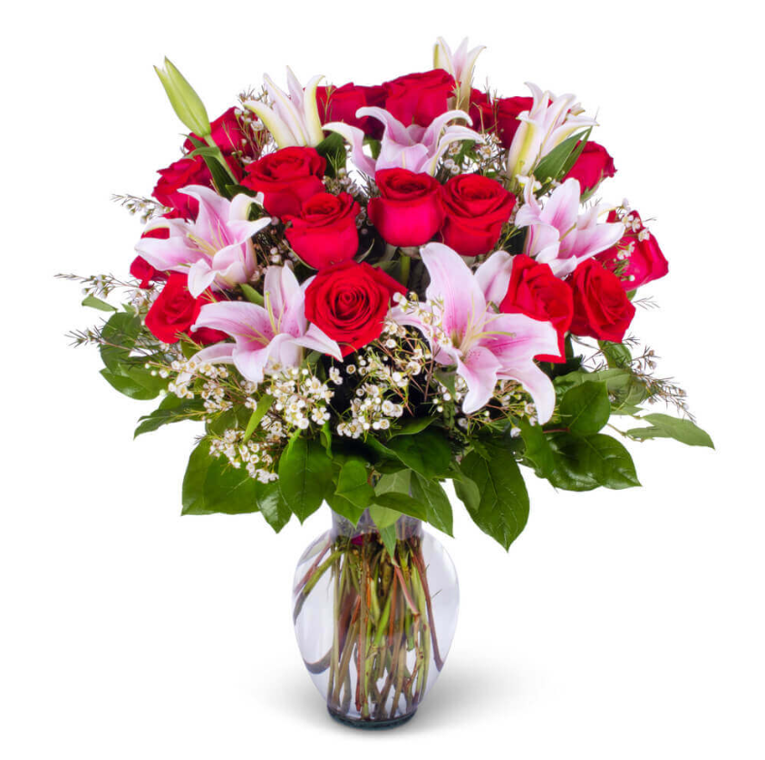 Vase arrangement with red roses, pink lilies, greenery from Joshua's Greenery Barrie florist