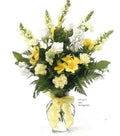 Yellow and white flower arrangement in glass vase with bow by Joshua's Greenery Barrie Florist