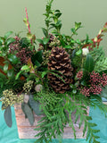 Rustic floral arrangement with pinecone, mixed greenery, berries in wood box, Joshua's Greenery