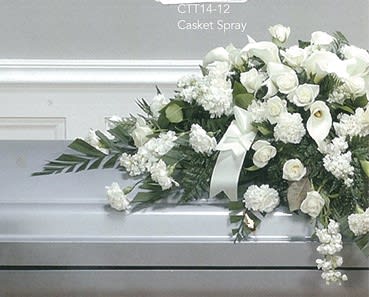 Elegant white floral casket spray arrangement by Joshua's Greenery Barrie Florist.