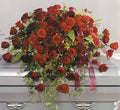 Large red rose casket spray with greenery by Joshua's Greenery Barrie Florist