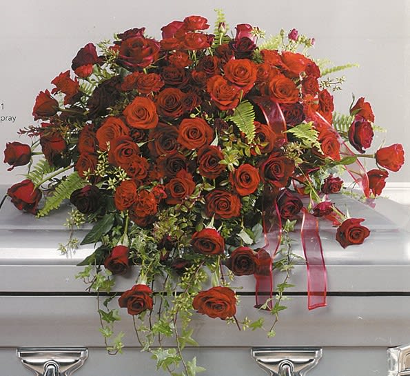 Large red rose casket spray with greenery by Joshua's Greenery Barrie Florist