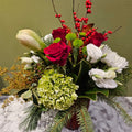 Festive floral arrangement with red roses, white blooms, hydrangea, and berries in vase, Joshua's Greenery