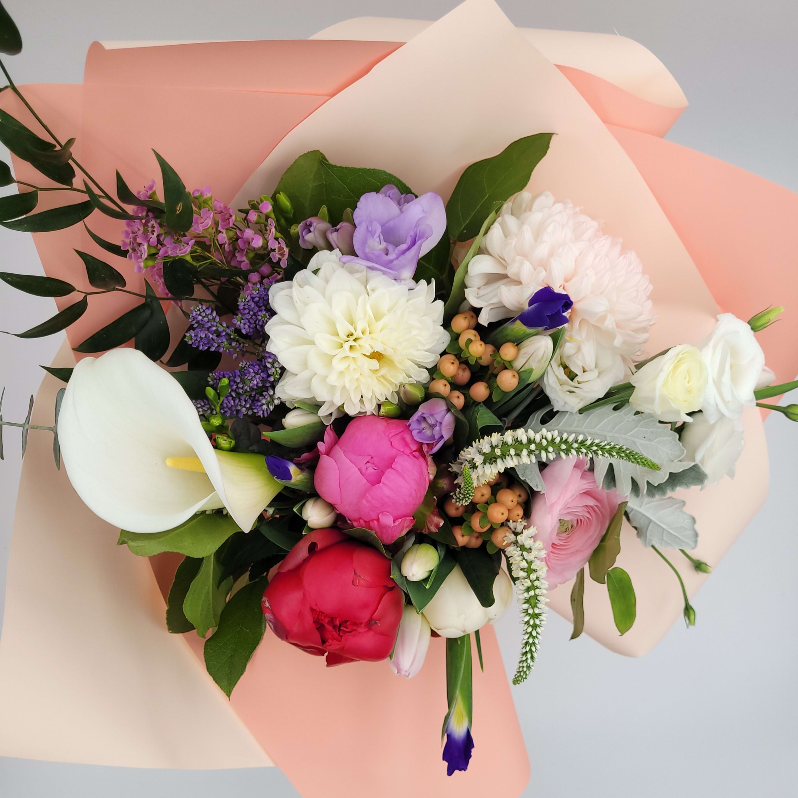 Colorful fresh flower bouquet with peonies, calla lily, roses and greenery from Barrie florist