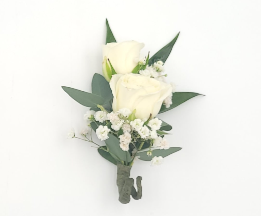 White rose boutonniere with greenery and baby’s breath by Joshua's Greenery Barrie Florist