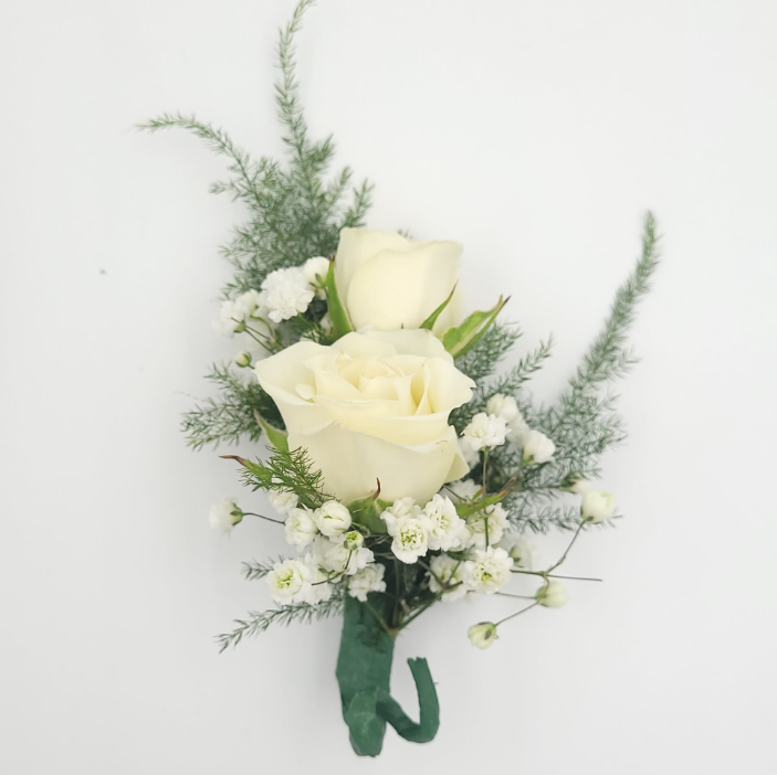 White rose boutonniere with greenery from Joshua's Greenery Barrie Florist