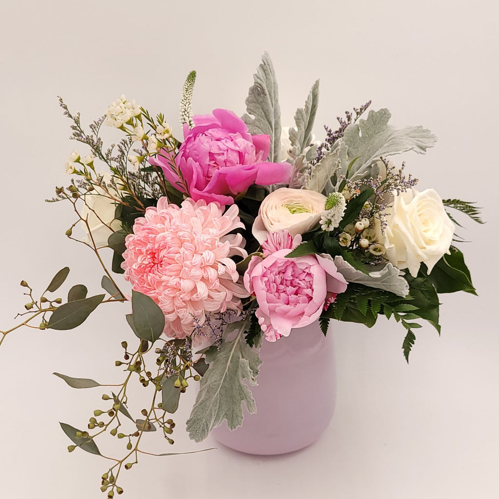 Pink peonies, roses, and greenery in a pastel vase from Joshua's Greenery Barrie Florist