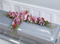 Pink and Magenta cross casket spray