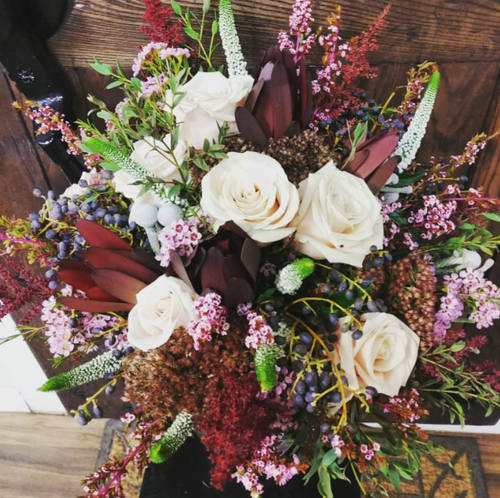 Bridal bouquet with cream roses, pink flowers, greenery from Joshua's Greenery Barrie Florist